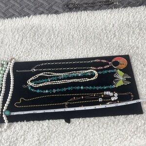 Lot of beaded/chain silver/gold necklaces.